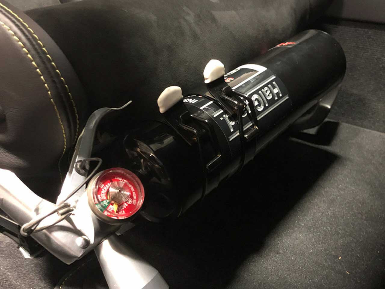 Rennline Fire Extinguisher Mount - Lightweight Carbon Bucket - SKU# FE24